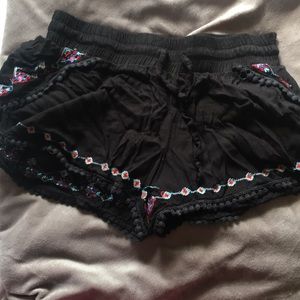 black shorts with detailing